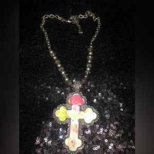 Silver beaded necklace with flower cross
